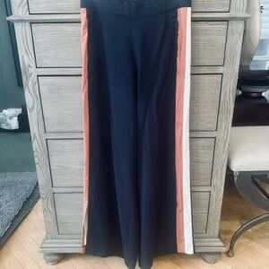 Women's wide leg Navy Pants with tan and and White Stripes. Size M.